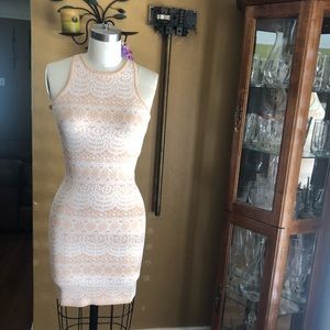 Fitted short orange /white dress